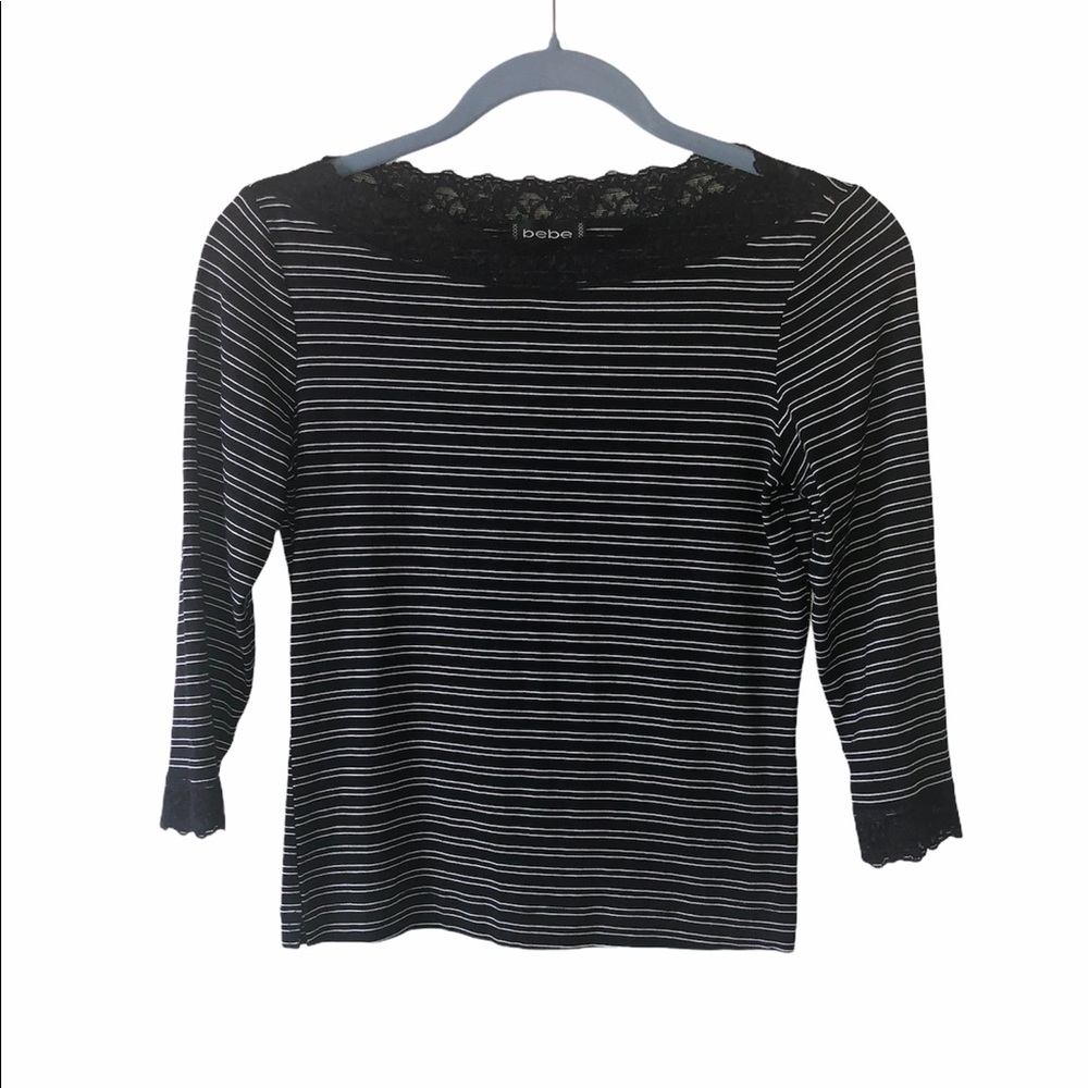Bebe black & white top with lace detail. Size L